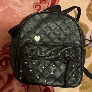 Chic Black Quilted Mini Backpack with Heart Studs